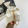 Mini Bolso Cubo de Lunares con Cordón para Mujer 2026 Nuevo Estilo Cadena Metálica Cruzado Pequeño Bolso Moda Combinación Bolso para Teléfono
