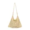 Bolsa de Malla Tejida Hueca de Verano para Mujer 2026 Nueva Bolso de Hombro de Gran Capacidad Estilo Casual de Centro Turístico Costero Bolsa de Playa