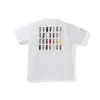 Comercio exterior mayorista transfronterizo estilo japonés moderno estampado de camuflaje cabeza de tiburón cabeza de tigre mono bloques de color luminoso para pareja camiseta holgada morada