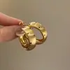 Estilo Retro Nostálgico Aros Circulares Dorados y Plateados con Puntos Negros, Aretes Grandes con un Toque de Lujo Ligero y Moda, Accesorios de Oreja Exagerados Versátiles de Alta Gama