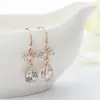 Hebilla de oreja de circonita de venta caliente transfronteriza pendientes largos de lazo para mujer pendientes simples de moda pendientes colgantes fabricantes