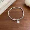 Pulsera de Cuentas Redondas con Colgante de Smiley Arcoíris Estilo Coreano Buena Suerte para Mujer Diseño de Nicho Ins Estilo Fresco de Gama Alta Combinable