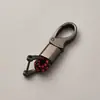 Directo de fábrica llavero de cuerda tejida accesorios de ferretería hebilla de herradura colgante para llave de coche accesorios de coche de moda