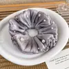 Goma para el pelo de gasa plisada fluida con cuentas para mujer, nuevo estilo de principios de primavera con un ambiente súper de hada, accesorio de goma para el pelo femenino