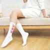 Calcetines de marca de moda, calcetines de tubo con personalidad callejera de estilo chino, calcetines de moda para estudiantes, calcetines con texto explosivo para hombres y mujeres.