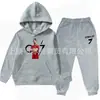 Ropa para Niños y Niñas Primavera y Otoño Nuevo Color Puro Estampado Ropa Infantil Conjunto de Dos Piezas de Sudadera y Pantalón de Terciopelo para Niños Estilo Americano