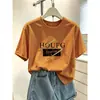 Camiseta de manga corta tie-dye azul con diseño único para mujer, moderna y versátil, adelgazante, hombro normal, top de algodón puro, verano 2026