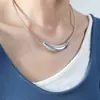 Nuevo collar de acero de titanio con superficie fotosensible avanzada, moda personalizada de lujo ligero transfronteriza, joyería creativa de nicho, joyería de temperamento simple para mujeres