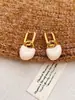 Pendientes de gota de agua irregulares de alta gama, pendientes versátiles de lujo ligero, diseño de nicho para mujer