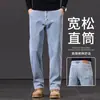 Jeans de alta gama para hombre, nuevo estilo otoño 2026, pantalones rectos holgados para hombre, pantalones largos casuales para primavera y otoño para hombres de mediana edad