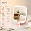 Espejo de maquillaje de mano con luz, espejo de maquillaje LED para estudiantes mujeres en dormitorios, alto valor estético, espejo portátil de escritorio mini