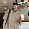 Camiseta de Manga Curta Masculina Verão Tendência Americana Splicing Gola Polo Solta Casual Manga Meia para Homens