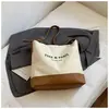 Bolso Casual de Gran Capacidad para Mujer 2025 Nuevo Popular Versátil Bolso de Hombro de Lona Estilo Popular de Celebridad de Internet Bolso Cruzado Tipo Cubo