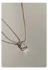 Collar de diamantes de imitación en forma de pera con diseño de nicho original para mujer, de alto carbono, de alta calidad, con temperamento de lujo y personalidad simple.