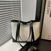 Bolso tote de gran capacidad para otoño, moda, textura simple, bolso de hombro para mujer, para el trabajo, popular 2024, bolsa de hermoso temperamento