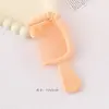 Nuevo y lindo mini peine de lazo con alto valor estético, peine de mango portátil para estudiantes, peine para peinar el cabello de niñas al por mayor