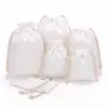 Sacolas de algodão ecológicas com cordão feitas sob medida lisas atacado com logotipo impresso personalizado embalagem de presente armazenamento sacolas de algodão com cordão