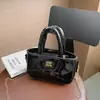 Primavera de 2026 Nova Bolsa de Mão Brilhante Estilo Princesa Alta Qualidade Moda Bolsa de Ombro Transversal para Meninas Transfronteiriça