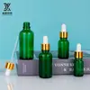 Botella de aceite esencial verde de fábrica de 10 ml botella con gotero de 30 ml botella pulverizadora botella de vidrio para cosméticos botella cuentagotas