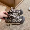 Zapatillas deportivas para niños 2026 otoño nuevo modelo para niñas anti-colisión estilo papá malla zapatillas de correr para niños mayores