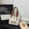 Bolsa de Lona de Gran Capacidad para Mujer, Nueva Tendencia Primavera 2026 Bolso Versátil para la Clase y el Trayecto Bolsa Tote