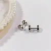 Aretes de Tuerca Geométricos de Estrella de Acero Titanio con Bolas de Acero Grandes y Pequeñas de Moda Simple al por Mayor de Fábrica de Venta Caliente Aretes Perforados Mujeres