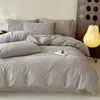 Luxo leve, conjunto de cama jacquard de algodão minimalista de quatro peças, novo estilo 2026, adequado para todas as estações, feito inteiramente de algodão, incluindo lençol de baixo e capa de edredom