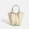 Bolso de cuero genuino para mujer más vendido, bolso tipo cesta de piel de vaca de capa superior, bolso tipo cubo versátil de gran capacidad, bolso de hombro para el día a día