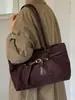 Bolso de mano de nicho muy elegante y casual estilo coreano, nuevo 2026 vintage color liso bolso relajado para el hombro y debajo del brazo