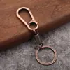 Colgante de llave de resorte cadena de llaves de coche de metal para hombres y mujeres hebilla de cintura personalizada creativa pequeño regalo regalo de tienda departamental