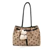 Bolso de mano casual de lunares con diseño de nicho, mochila elegante de moda de alta gama, bolso de hombro de gamuza chic vintage
