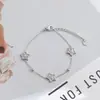 Estilo Minimalista de Lujo Nicho Pulsera de Acero de Titanio Incrustada con Pedrería de Estrella de Cinco Puntas para Mujer Moda Commute Joyería de Mano de Estrella de Lujo Ligero Transfronteriza