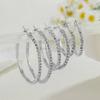 Conjunto de varias piezas de pendientes y anillo de aleación de diamantes para mujer, estilo europeo y americano, de moda transfronteriza, adecuado para fiestas de viajeros.