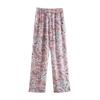 Aliexpress Venta al por mayor de ropa europea y americana transfronteriza para mujer Primavera temprana 2025 Nuevo Pantalones casuales de satén con graffiti de anacardo de temperamento