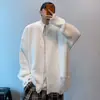 Nuevos suéteres de punto para otoño e invierno para hombres y parejas, chaquetas cárdigan con agujeros, estilo callejero europeo y americano de moda, venta al por mayor de fábrica transfronteriza