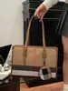 Bolsa de Ombro Feminina Grande Capacidade Estilo Coreano 2026 Novo Modelo Bolsa de Mão Simples Listrada Vertical Casual Sacola Tote Moda