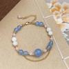 Pulsera Guofeng con cuentas de piedra natural, pulsera fresca con doble borla, pulsera de lujo ligera y de alta gama.