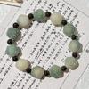 Pulsera de bodhi de flor flotante en polvo natural para hombres y mujeres camelia anillo individual pulsera de mano cuentas cuentas texto placa de juego cuerda venta al por mayor