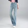 Jeans boca de sino de cintura alta customizado com strass para mulheres, novo estilo de outono, popular este ano, com efeito emagrecedor e que molda o corpo.