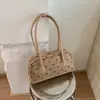 Bolso de hombro de moda estilo coreano con lunares Shuai Mijia 2026 otoño nuevo de gran capacidad para el trabajo bolso Boston exquisito