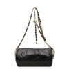 Bolso pequeño tipo cilindro con relleno de algodón de moda para mujer, nuevo estilo popular otoño e invierno 2024, bolso cruzado con cadena de diamantes para el hombro