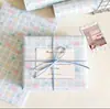 Papel de regalo de lazo y estrella, caja de regalo de cumpleaños estilo ins, papel de regalo de recuerdo de floristería, venta al por mayor y hecho a medida