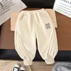 Calça de Inverno Infantil Peça Única Grossa de Fleece Meninos Meninas Cor Sólida Estampa da Moda Atacado