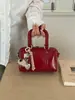 Bolso Almohada de Cuero Suave Retro de Gama Alta para Mujer 2025 Nuevo Versátil de Nicho Bolso Cilíndrico de Lujo Ligero Bolso de Mano Bolso Cruzado