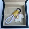 Dinero en el Caballo Cuero de Vaca Creativo Exquisito Casual Regalo de Pareja Bolso Lindo Colgante Llavero de Coche Llavero