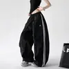 Pantalones anchos de retazos a rayas casuales estilo americano para mujer, nuevo modelo primavera 2026, pantalones deportivos casuales de corte holgado para bailar y street dance, modernos