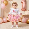 Outono/Inverno 2026 Novo Conjunto de Vestido e Saia para Festival de Bebê Menina Body de Manga Longa para Bebê Saia Faixa de Cabelo Conjunto de 3 Peças