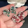 ¡Colores ricos y vibrantes! Pendientes de flor de circonita cúbica de colores, pendientes de estilo corte vintage, pendientes de alta gama transfronterizos europeos y americanos para mujer
