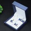 Colgante de cristal azul de cuatro piezas, collar de cristal para niña, anillo de mariposa, pendientes de cristal de moda, regalo de cumpleaños