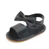 Novedad de verano 0-1 año niña bebé lazo PU suela blanda zapatos para niños pequeños sandalias para bebé venta al por mayor 0960